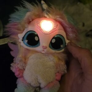 Colorful Plush Unicorn Toy with Light-Up Heart